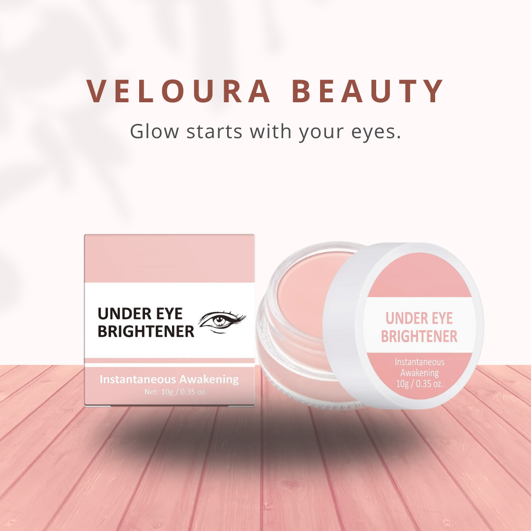 Veloura Beauty under eye brightener with packaging on a wooden surface